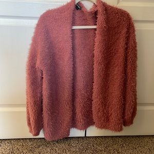 Pink cardigan sweater